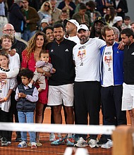 Jo-Wilfried Tsonga was joined by his friends and family during a presentation ceremony after the match.
Mandatory Credit:	Clive Brunskill/Getty Images Europe/Getty Images