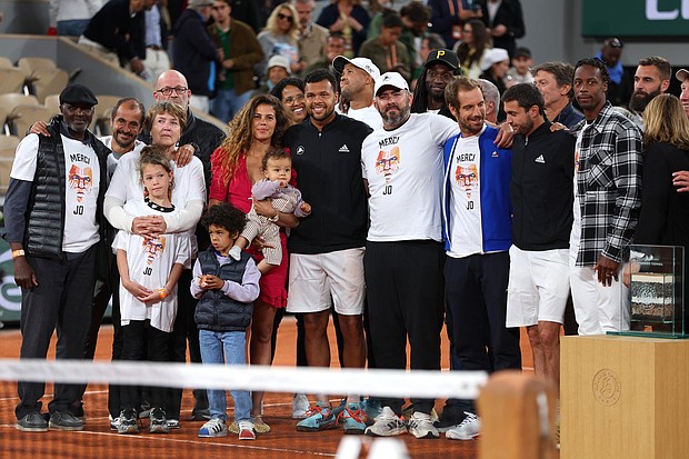 Jo-Wilfried Tsonga was joined by his friends and family during a presentation ceremony after the match.
Mandatory Credit:	Clive Brunskill/Getty Images Europe/Getty Images