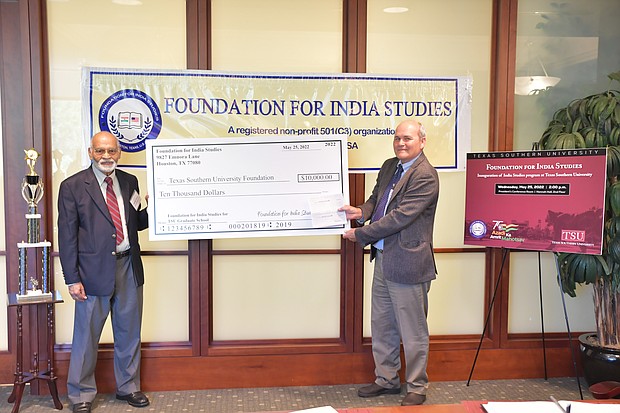Krishna Vavilala (left), founder and chairman of the Foundation for India Studies, presents a $10,000 check to Dr. Gregory Maddox, dean of The Graduate School at Texas Southern University, for the creation of a new India Studies program at the University.