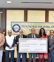 Representatives from the Foundation for India Studies present a $10,000 check to faculty and academic leadership of Texas Southern University for the creation of a new India Studies program. A committee of TSU faculty, facilitated by the TSU Graduate School, will oversee the program with the Foundation for India Studies serving in an advisory capacity.