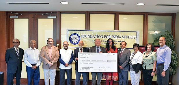 Representatives from the Foundation for India Studies present a $10,000 check to faculty and academic leadership of Texas Southern University for the creation of a new India Studies program. A committee of TSU faculty, facilitated by the TSU Graduate School, will oversee the program with the Foundation for India Studies serving in an advisory capacity.