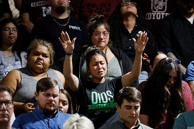 Families of the 19 students and two teachers killed in a shooting at a Texas elementary school have begun to make funeral arrangements for their loved ones as harrowing new details of the attack and its aftermath continue to emerge.
Mandatory Credit:	Marco Bello/REuters