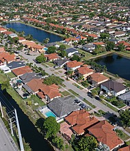 Mortgage rates fell for a second consecutive week, but still remain above 5%.
Mandatory Credit:	Joe Raedle/Getty Images