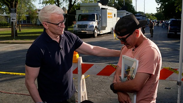 Med aide Angel Garza, right, rushed to Robb Elementary School on May 24 and arrived as officials started escorting shell-shocked children from the classrooms.
Mandatory Credit:	CNN