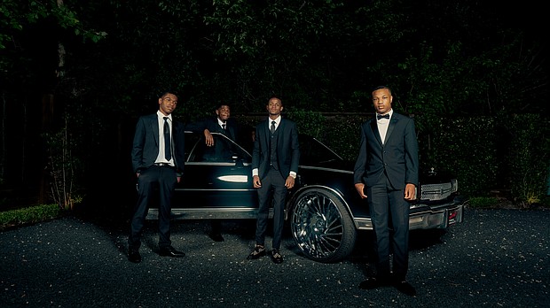 Owner of 713 Motoring, Ashworth "Big Ash" Barnes, with the students of the
Automotive Customization Skills Trade Program