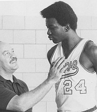 Carl Peal, the former Petersburg High School and Peabody High School coach died May 16 at age 94. This photo, taken in 1974 or 1975, shows Mr. Peal and his star player, the late Moses Malone.