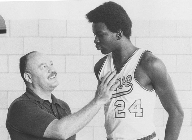 Carl Peal, the former Petersburg High School and Peabody High School coach died May 16 at age 94. This photo, taken in 1974 or 1975, shows Mr. Peal and his star player, the late Moses Malone.