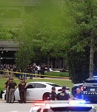 Four people were killed in Tulsa on June 1 after a gunman -- who was later found dead -- opened fire on the second floor of a medical building, authorities in Oklahoma said.
Mandatory Credit:	MICHAEL NOBLE JR./REUTERS