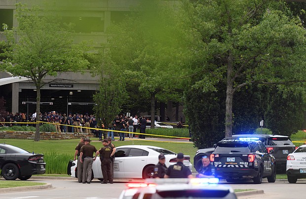 Four people were killed in Tulsa on June 1 after a gunman -- who was later found dead -- opened fire on the second floor of a medical building, authorities in Oklahoma said.
Mandatory Credit:	MICHAEL NOBLE JR./REUTERS