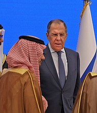 Oil prices fell on June 2 on reports that OPEC could start to pump more crude to make up for a drop in Russian production caused by Western sanctions. Russian Foreign Minister Sergei Lavrov, center, is pictured visiting Saudi Arabia this week.
Mandatory Credit:	Fayez Nureldine/AFP/Getty Images