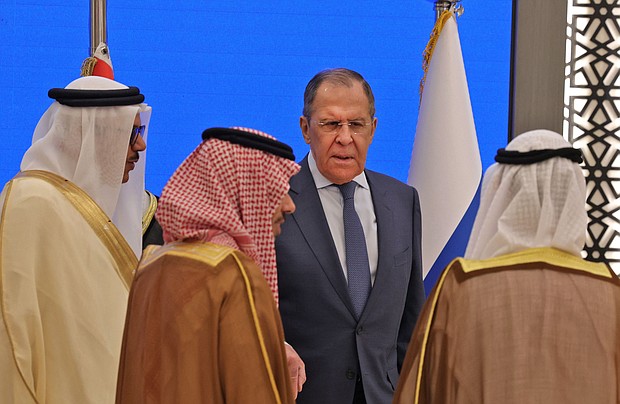Oil prices fell on June 2 on reports that OPEC could start to pump more crude to make up for a drop in Russian production caused by Western sanctions. Russian Foreign Minister Sergei Lavrov, center, is pictured visiting Saudi Arabia this week.
Mandatory Credit:	Fayez Nureldine/AFP/Getty Images