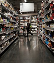 Prices are rising for just about everything, forcing millions of Americans to make increasingly difficult choices.
Mandatory Credit:	Spencer Platt/Getty Images