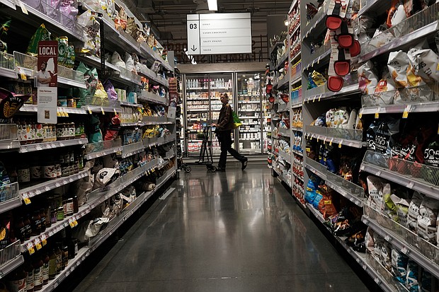 Prices are rising for just about everything, forcing millions of Americans to make increasingly difficult choices.
Mandatory Credit:	Spencer Platt/Getty Images