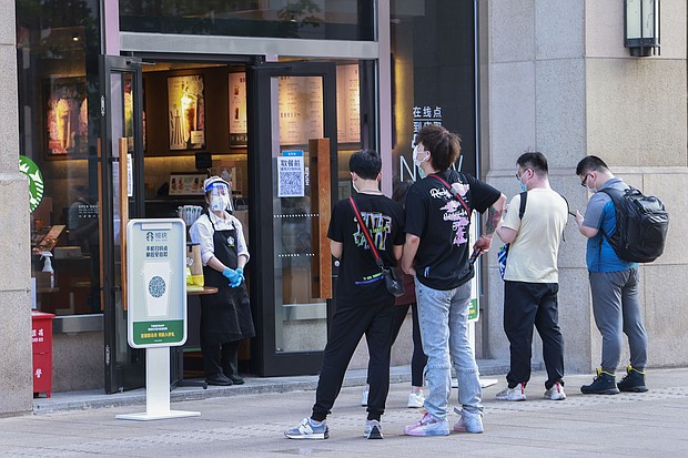 Starbucks is reopening in Shanghai as restrictions lift.
Mandatory Credit:	VCG/Visual China Group/Getty Images