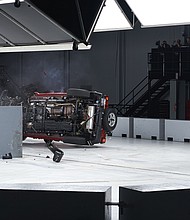 This photo shows a "small overlap crash test" being conducted on March 10, on a 2022 model year 4-door Jeep Wrangler which resulted in the vehicle tipping over. This was a repeat of a test done two years ago on a 2019 Wranger which also tipped over.
Mandatory Credit:	IIHS