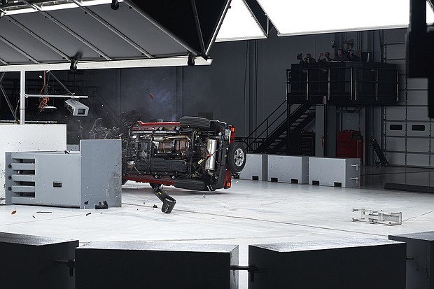 This photo shows a "small overlap crash test" being conducted on March 10, on a 2022 model year 4-door Jeep Wrangler which resulted in the vehicle tipping over. This was a repeat of a test done two years ago on a 2019 Wranger which also tipped over.
Mandatory Credit:	IIHS