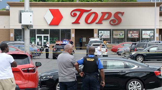 Buffalo Police on scene at a Tops Friendly Market on May 14 in Buffalo, New York. A 911 dispatcher who mishandled a call from a Buffalo supermarket manager during the fatal May shooting was fired on June 2, the Erie County Department of Personnel confirmed to CNN.
Mandatory Credit:	John Normile/Getty Images