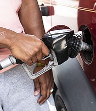 The national average jumped to $4.87 a gallon, according to AAA, that's up 25 cents in the past week and 59 cents in the past month.
Mandatory Credit:	Joshua Roberts/Bloomberg via Getty Images