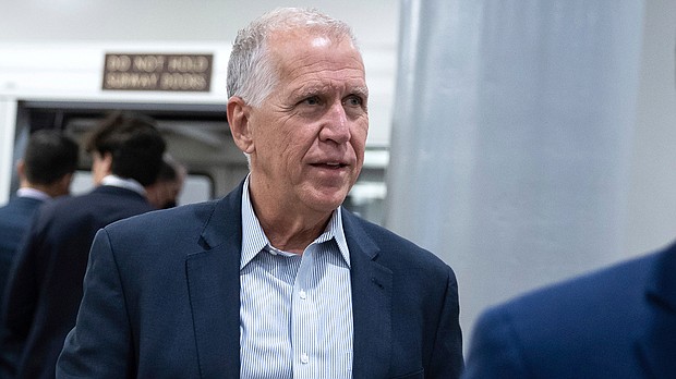 Sen. Thom Tillis (R-N.C.) walks to a vote at the U.S. Capitol June 6. The two leading GOP senators involved in gun talks on Capitol Hill signaled that it's unlikely Congress will raise the age requirement for purchasing semiautomatic firearms to 21, instead saying they are looking at changing the criminal background check system to access juvenile records before a sale is complete.
Mandatory Credit: Francis Chung/E&E News/POLITICO/AP