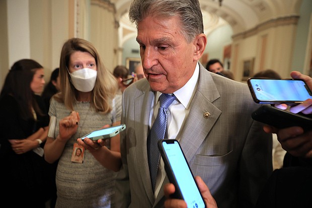 Sen. Joe Manchin pictured at the U.S. Capitol on July 20, 2021 in Washington, voiced his support for raising the age to 21 for purchasing semi-automatic weapons and questioned why individuals need to own high-powered AR-15-style weapons.
Mandatory Credit: Chip Somodevilla/Getty Images
