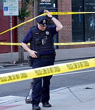 Officials are urging witnesses to come forward as they search for the shooters who fired into a Philadelphia crowd, leaving 3 dead and 11 wounded.
Mandatory Credit:	Michael Perez/AP