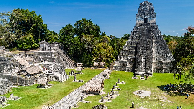 Tourists gather at the archaeological site Tikal, Guatemala. The Central American country is now at Level 2.
Mandatory Credit:	Matyas Rehak/Adobe Stock