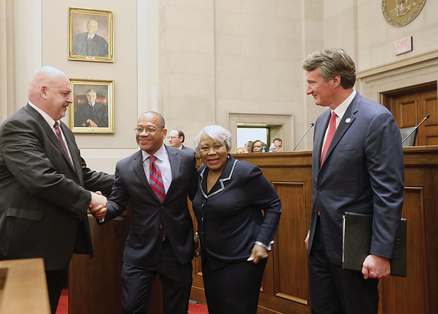 peaker of the Virginia House of Delegates C. Todd Gilbert, left, congratulates the newly sworn-in chief justice of the Supreme Court of Virginia S. Bernard Goodwyn, second from left as President Pro Tempore of the Senate of Virginia L. Louise Lucas hugs him and Gov. Glenn A. Youngkin looks on.