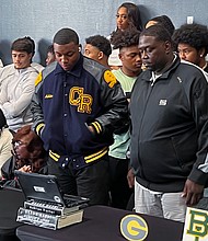 Porter shares a special moment with his family and friends in attendance.