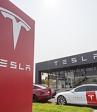 Tesla, pictured here, in California, United States on September 25, 2021 announced that it will ask investors to split its shares 3-to-1 at its annual meeting in August.
Mandatory Credit:	Yichuan Cao/Sipa USA/AP