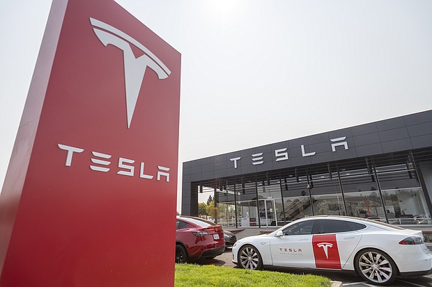 Tesla, pictured here, in California, United States on September 25, 2021 announced that it will ask investors to split its shares 3-to-1 at its annual meeting in August.
Mandatory Credit:	Yichuan Cao/Sipa USA/AP