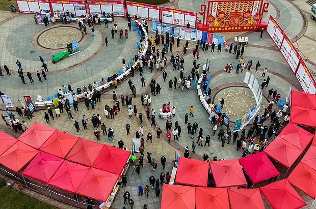 China is urging college graduates to seek jobs in the countryside as youth unemployment in urban areas soars to the highest level in history., and pictured, aerial photo shows a job fair held in Zigui, central China's Hubei Province, Feb. 8.
Mandatory Credit:	Zheng Jiayu/Xinhua/Getty Images