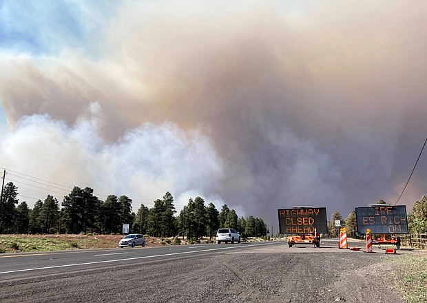 Authorities evacuated hundreds of households due to a fire in the outskirts of Flagstaff, Arizona.
Mandatory Credit:	Felicia Fonseca/AP