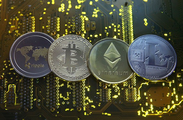 Bitcoin and other cryptocurrencies pictured here, on February 14, 2018 are plunging, and two of the world's biggest cryptocurrency platforms have restricted activity as the market meltdown continues apace.
Mandatory Credit:	Dado Ruvic/Reuters