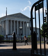 The Supreme Court dismissed an appeal on June 15 brought by a group of Republican-led states seeking to intervene in a case challenging the Trump-era "public charge" immigration policy, a version of which the Biden administration has abandoned.
Mandatory Credit:	Eric Lee/Bloomberg/Getty Images