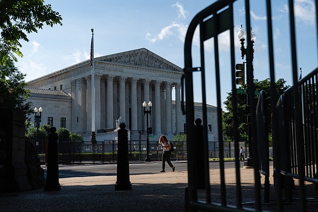 The Supreme Court dismissed an appeal on June 15 brought by a group of Republican-led states seeking to intervene in a case challenging the Trump-era "public charge" immigration policy, a version of which the Biden administration has abandoned.
Mandatory Credit:	Eric Lee/Bloomberg/Getty Images