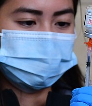 Vaccine advisers to the US Food and Drug Administration decided unanimously June 14 in favor of expanding the emergency use authorization of Moderna's Covid-19 vaccine to include older children and teens, ages 6 to 17, saying it would offer more benefits than risks.
Mandatory Credit:	FREDERIC J. BROWN/AFP/Getty Images