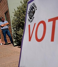 People wait in line to vote on Tuesday, June 14, in Las Vegas.
Mandatory Credit:	John Locher/AP
