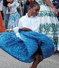 Asia Anthony was among the La Palma dance group’s energetic performers during Saturday’s ¿Qué Pasa? Festival in Shockoe Slip. The Virginia Hispanic Chamber of Commerce sponsors the festival to showcase the diversity and beauty of Hispanic and Latin American cultures. The festival was canceled for two years due to the COVID-19 pandemic.