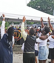 The choir from Swansboro Elementary performs at the cemetery. The city opened the cemetery in 1816 as the last resting for slaves and free Black people and offered burials there until 1879. Now considered the largest municipal cemetery for Black people in the country, the 30-acre burying ground was promptly forgotten, with the city selling off pieces while allowing railroad tracks and highways to be run through the gravesite. The city recently repurchased 1.5 acres; Monday night, City Council incorporated the cemetery into plans for a slavery memorial and museum that are to be developed next to Main Street Station.