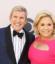 Todd and Julie Chrisley, pictured here, on April 2, 2017 in Las Vegas, Nevada are speaking out about the "very sad, heartbreaking time" for their family after they were convicted of conspiracy to defraud banks of more than $30 million in loans.
Mandatory Credit:	Michael Tran/FilmMagic/Getty Images