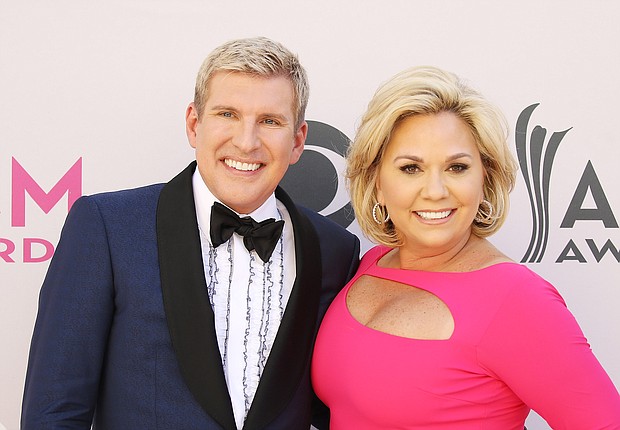 Todd and Julie Chrisley, pictured here, on April 2, 2017 in Las Vegas, Nevada are speaking out about the "very sad, heartbreaking time" for their family after they were convicted of conspiracy to defraud banks of more than $30 million in loans.
Mandatory Credit:	Michael Tran/FilmMagic/Getty Images