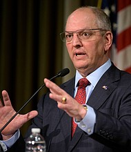 Louisiana's Democratic governor John Bel Edwards has signed a bill that will toughen an abortion ban that is ready to be implemented in the event that the Supreme Court overturns Roe v. Wade.
Mandatory Credit:	Matthew Hinton/AP