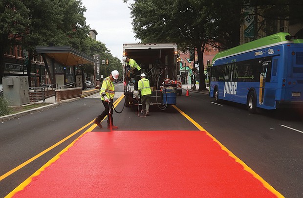 The red lane coating is the international standard for transit-only traffic, and is designed to help drivers and pedestrians be more aware of the Pulse-only lanes as well as to help buses run more smoothly.