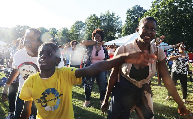 Corey Massenburg, 11, right, and his mother, Chanta Massenburg, were among enthusiastic fans on June 18 during Virginia Union University’s Hezekiah Walker Center for Gospel Music’s 2nd Annual Juneteenth Sounds of Freedom concert.