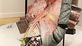 The Valentine Museum’s temporary exhibit of the Jefferson Davis statue shows the former Confederate leader splattered with pink paint, a blackened face and a dent on the back of the head as a result of the protesters’ actions two years ago.