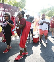 File photo taken last year of football fans lined up for the first day of training camp for the Washington team.