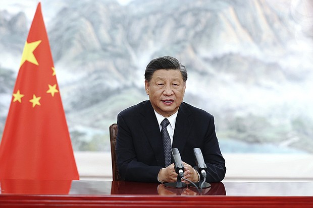 Chinese leader Xi Jinping, pictured on June 22 set the tone for a virtual summit with leaders from major emerging economies in a pointed speech, in which he decried sanctions as "weaponizing" the global economy and urged unity in the face of financial challenges.
Mandatory Credit:	Ju Peng/AP