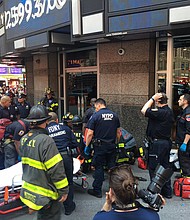 First responders attend to a person after a car was driven into pedestrians in Times Square in 2017.
Mandatory Credit:	FDNY/twitter