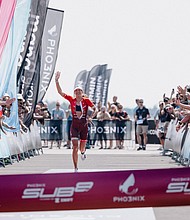 Nicola Spirig crosses the finish line in Germany at the end of the Phoenix Sub8 project.
Mandatory Credit:	MANA