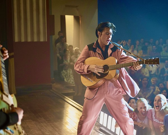 Baz Luhrmann photobombs this Elvis portrait with over-extravagant filmmaking that dwarfs the iconic rock and roller. And that ain’t easy.